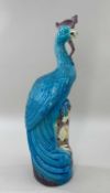 CHINESE PORCELAIN MODEL OF A PHOENIX, late 20th Century, glazed in turquoise and aubergine,