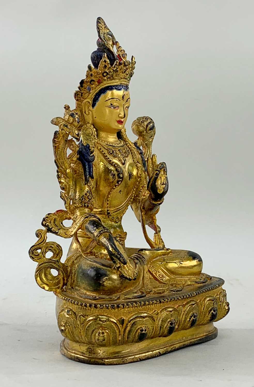 SINO-TIBETAN OR NEPALESE GILT BRONZE FIGURE OF GREEN TARA, seated in dhyanasana on lotus pedestal, - Image 2 of 3