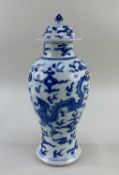 CHINESE BLUE & WHITE PORCELAIN 'DRAGON & PHOENIX' VASE & COVER, of baluster form, painted in the