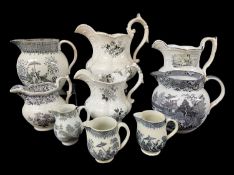 NINE 19TH /18th CENTURY WELSH POTTERY / PEARLWARE JUGS WITH BLACK TRANSFERS including Swansea ‘
