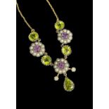 9CT GOLD SUFFRAGETTE-STYLE PEARL & GEM-SET NECKLACE, amethysts, seed pearls, peridots and two