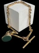 9CT GOLD FANCY LINK ALBERT CHAIN, with T-bar, claw clip and bloodstone seal fob, 36cm long