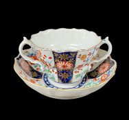 WORCESTER KAKIEMON PORCELAIN CHOCOLATE CUP & SAUCER, c. 1770-80, decorated in the 'Rich Queens'
