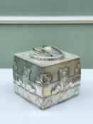 ARCHIBALD KNOX FOR LIBERTY & CO.: 'TUDRIC' PEWTER BISCUIT BOX, of shaped square form, each side