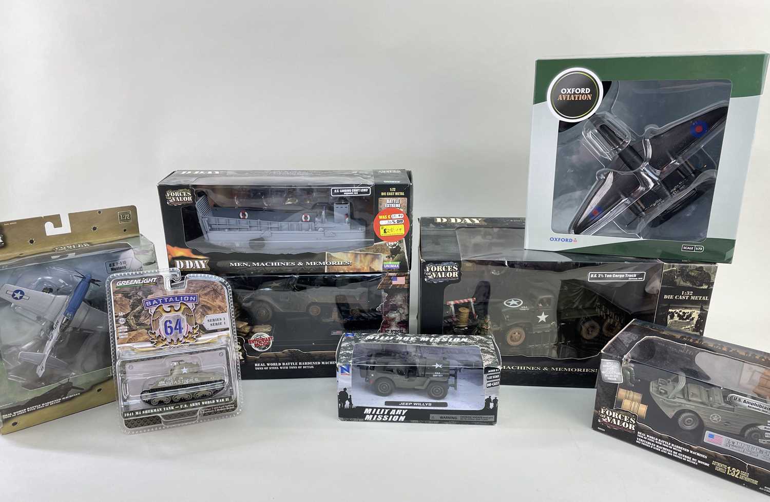 'FORCES OF VALOR' MODEL MILITARY VEHICLES to include, US 2.5 ton cargo truck, US M16 Multiple Gun