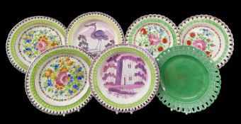 GROUP OF SEVEN SWANSEA POTTERY RIBBON PLATES having basket-weave moulded borders, comprising two