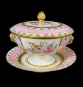 STAFFORDSHIRE PORCELAIN SAUCE TUREEN, COVER & STAND, c. 1820, with gilt satyr mask handles and bud