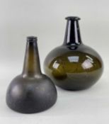 TWO GLASS ONION BOTTLES, comprising a large compressed spherical bottle in olive green glass, 25cm