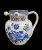 SWANSEA CAMBRIAN PUZZLE JUG circa 1810, ovoid shape and loop handle, with cylindrical neck pierced