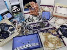 ASSORTED MODERN COSTUME JEWELLERY, comprising mainly coloured bead necklaces and bracelets, some