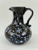 LARGE NAILSEA GLASS JUG, c. 1800, globular form with slightly waisted neck and pinched spout,