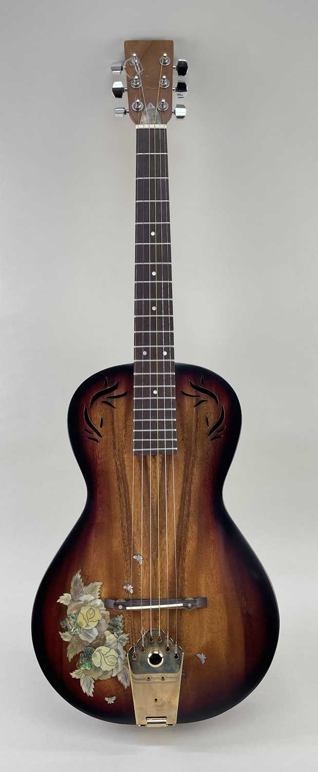 ACOUSTIC GUITAR WITH FLOWER & BUTTERFLY DETAIL INLAY, with custom sound holes Comments: comes in