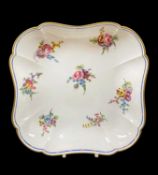 SEVRES PORCELAIN DESSERT DISH, date code 1774, of lobed square form, decorated with seven sprays