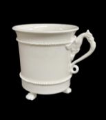 BELEIVED SWANSEA PORCELAIN CABINET CUP circa 1815-1817, raised over three claw feet and with gryphon