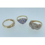 THREE 14CT GOLD DIAMOND RINGS, comprising multi diamond chip interlaced ring, purple gem set ring