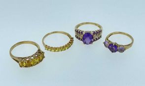 FOUR 9CT CITRINE OR AMETHYST RINGS, including a five-stone citrine and a facet cut oval amethyst