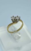 18CT GOLD TWO STONE DIAMOND RING, twist shank, 0.4cts overall approx., ring size L, 2.9gms, in