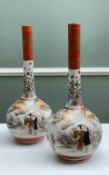 PAIR JAPANESE KUTANI PORCELAIN BOTTLE VASES, Late Meiji Period, decorated with figures amongst