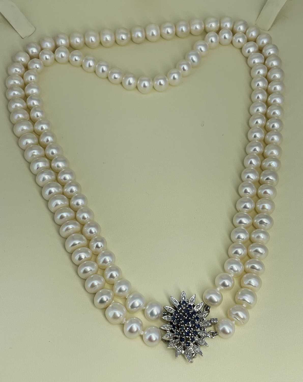 AKOYA CULTURED PEARL DOUBLE ROW NECKLACE, with sapphire and diamond chip clasp stamped '14K', - Image 2 of 2