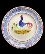 LLANELLY POTTERY COCKEREL PLATE, c. 1900, probably by Sarah Roberts, neatly sponged floret border,