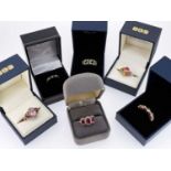 SIX 9CT GEM SET RINGS, including an oval morganite ring, six-stone multi-colour gem ring, 3-stone