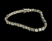 9CT WHITE GOLD & CZ TENNIS BRACELET, gross wt. 9.6g