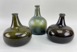 THREE GLASS ONION WINE BOTTLES, 1 deep olive and 2 iridescent, 2 of compressed form, the other