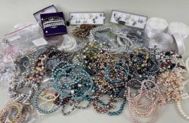 ASSORTED MODERN COSTUME JEWELLERY, comprising mainly coloured bead and simulated pearl necklaces,