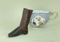 ANTIQUE MINIATURE LEATHER RIDING BOOT, possibly a cobbler's apprentice piece, 6.5cm high (NB. cup