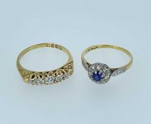 TWO ANTIQUE 18CT GOLD RINGS, comprising sapphire and diamond cluster ring of good colour, and 5-