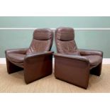 PAIR MODERN DE SEDE BROWN LEATHER EASY ARMCHAIRS, with reclining backs (2)Comments: arms worn,