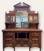 EDWARDIAN ARTS & CRAFTS STYLE WALNUT CABINET, by Trapnell & Gane of Bristol, with angled pediment,