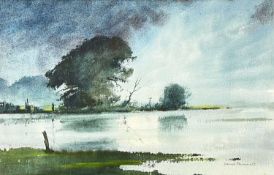 DENIS PANNETT (British, b. 1939) watercolour - view across river mouth with dark threatening clouds,