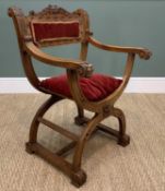 EARLY 20TH CENTURY SAVONAROLA CARVED WALNUT ARMCHAIR, with red velvet padded back, loose cushion and