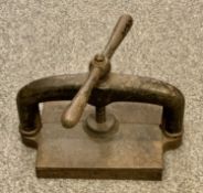 VICTORIAN CAST IRON BOOK PRESS - with central screw thread and baton handle, the platen 25 x