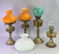 BRASS OIL LAMPS, A PAIR with circular bases, fluted columns, circular reservoirs, Duplex twin