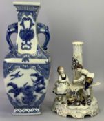 CHINESE BLUE & WHITE VASE, 20th century, of square baluster form with mask head side handles,