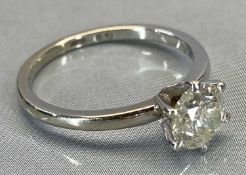 14CT WHITE GOLD SOLITAIRE DIAMOND RING - claw set round brilliant, assessed as 1.03ct, colour