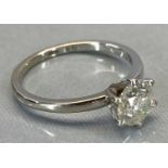 14CT WHITE GOLD SOLITAIRE DIAMOND RING - claw set round brilliant, assessed as 1.03ct, colour