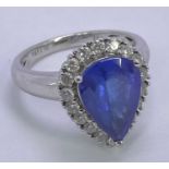 18CT WHITE GOLD PEAR CUT TANZANITE & DIAMOND RING - facet cut central stone in excess of 2cts, 9 x