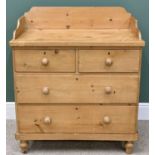 VICTORIAN STRIPPED PINE CHEST - having two short over two long drawers with turned wooden knobs,