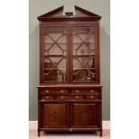 CHIPPENDALE STYLE MAHOGANY BOOKCASE CUPBOARD - elegant example with fretwork pediment, blind