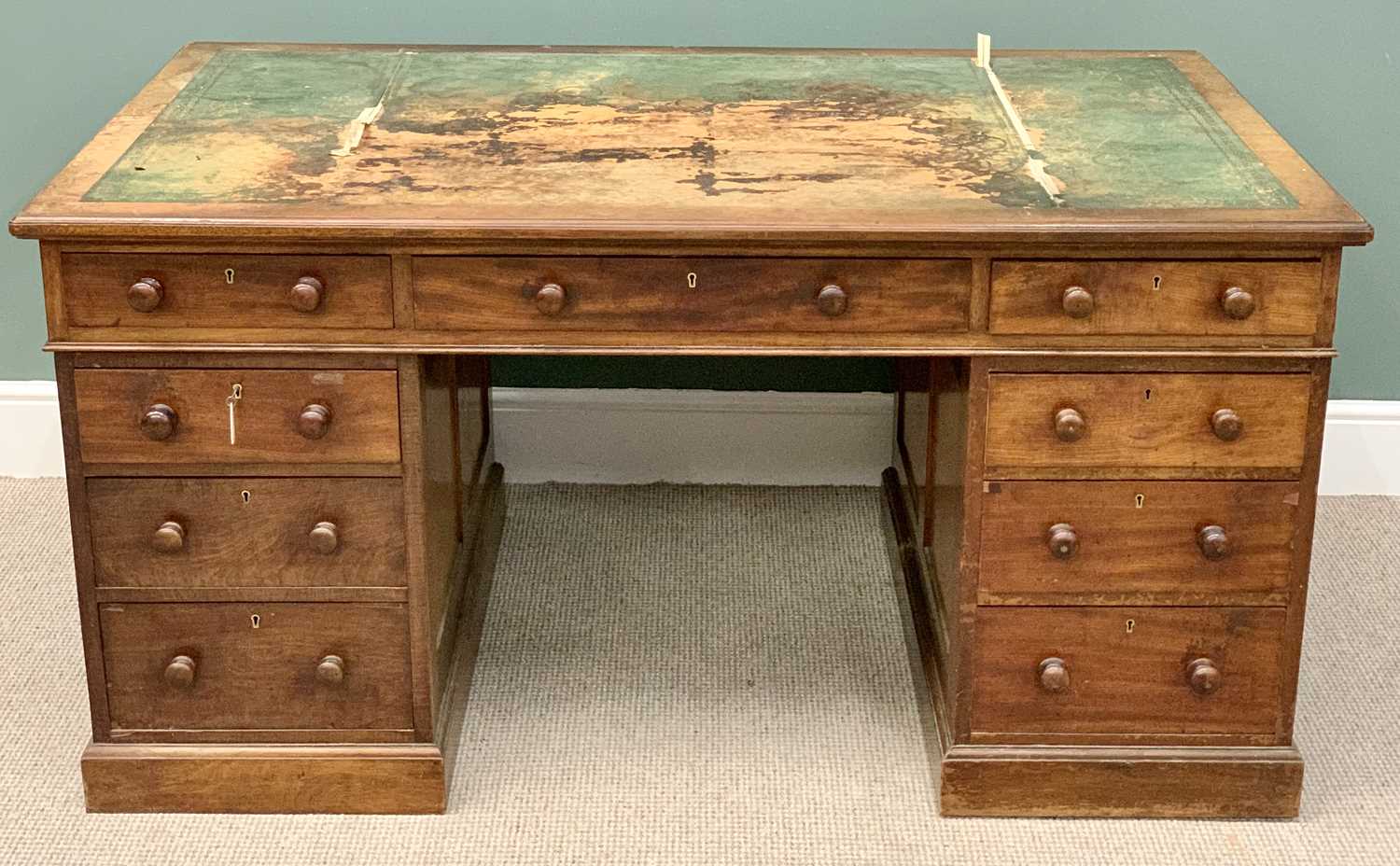 VICTORIAN MAHOGANY TWIN PEDESTAL DESK - a large example having multiple drawers and turned wooden