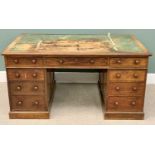 VICTORIAN MAHOGANY TWIN PEDESTAL DESK - a large example having multiple drawers and turned wooden