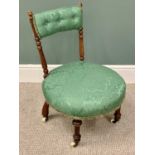 EDWARDIAN UPHOLSTERED NURSING TYPE CHAIR - on turned supports and castors, 71cms H, 50cms diameter