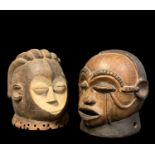 TWO HELMET MASKS, inluding Tsogo white faced mask and Tabwa mask, 24cm h (2)