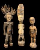 THREE NIGERIAN STANDING FIGURES, including Eket and Igbo examples, tallest 89cm (3)