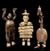 THREE AFRICAN FIGURAL MUSICAL INSTRUMENTS, including standing mbira and standing harp, and