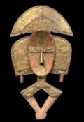 KOTA RELIQUARY GUARDIAN FIGURE. overlaid with copper and brass sheet, 57.5cm h