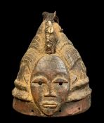 WEST AFRICAN CONICAL CREST MASK, with animal hair and shell fetish bundle, 27cm h